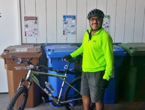 Leo from Marin Sanitary Service rides into work
