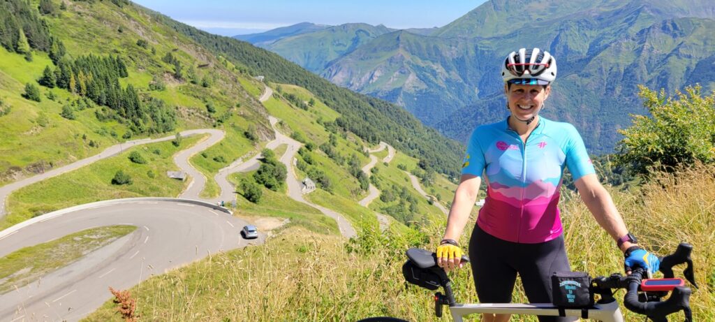 Liz at the top of a climb Tour de France Femmes