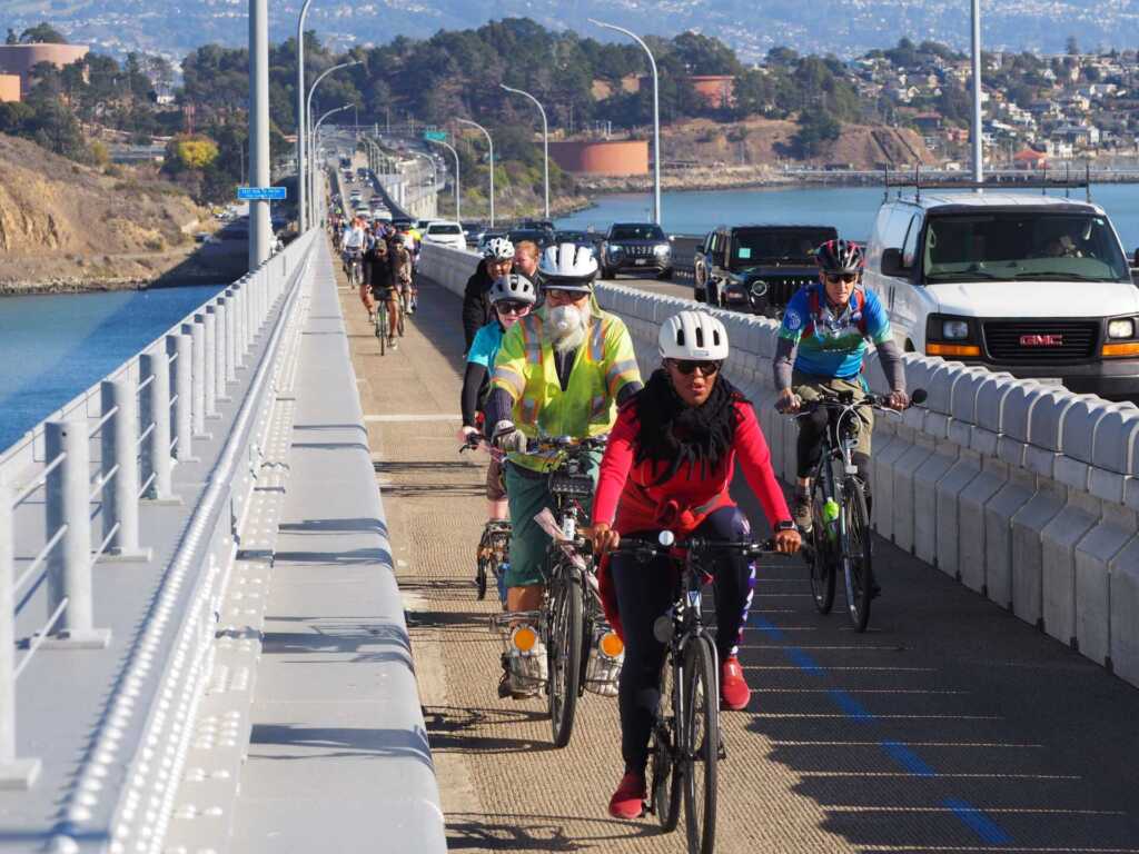 People riding bikes on the Richmond-San Rafael Bridge