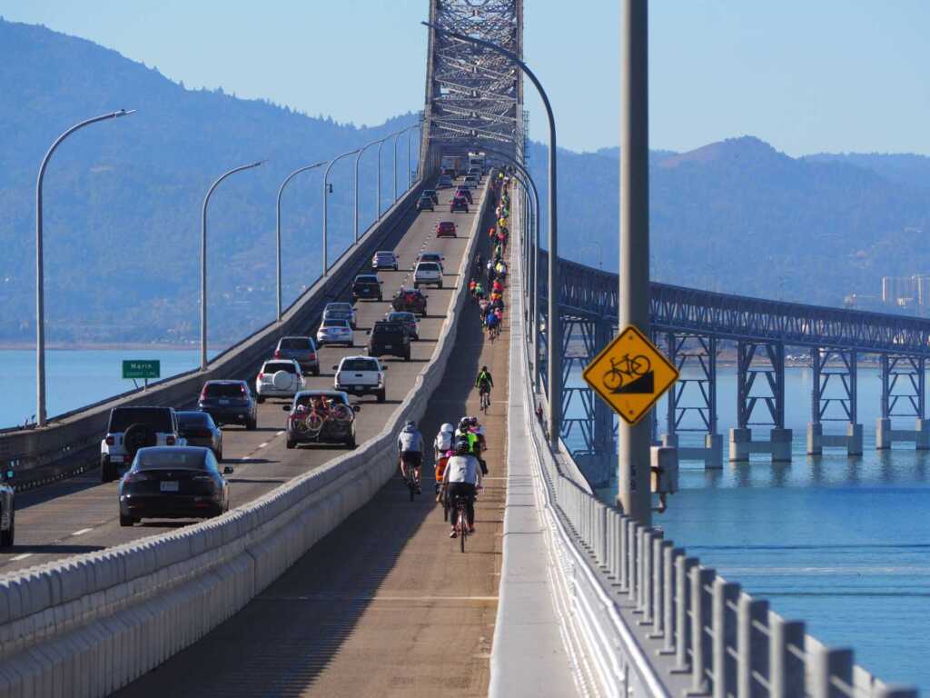 Richmond San Rafael Bridge In Peril. Bike riders on bridge pathway
