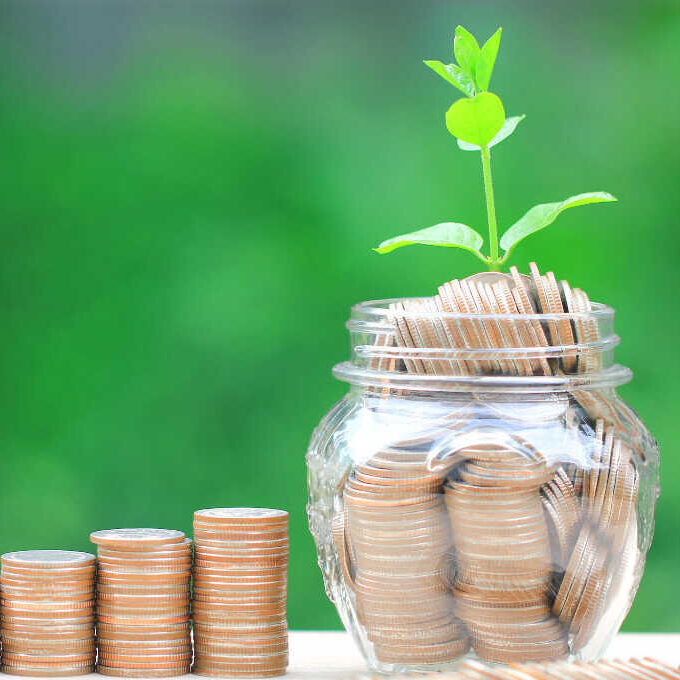 pennies lined up next to a jar Charitable Donation Webinar