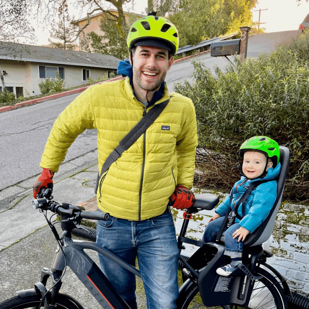 Dad and baby with bike Bike Champion awardee