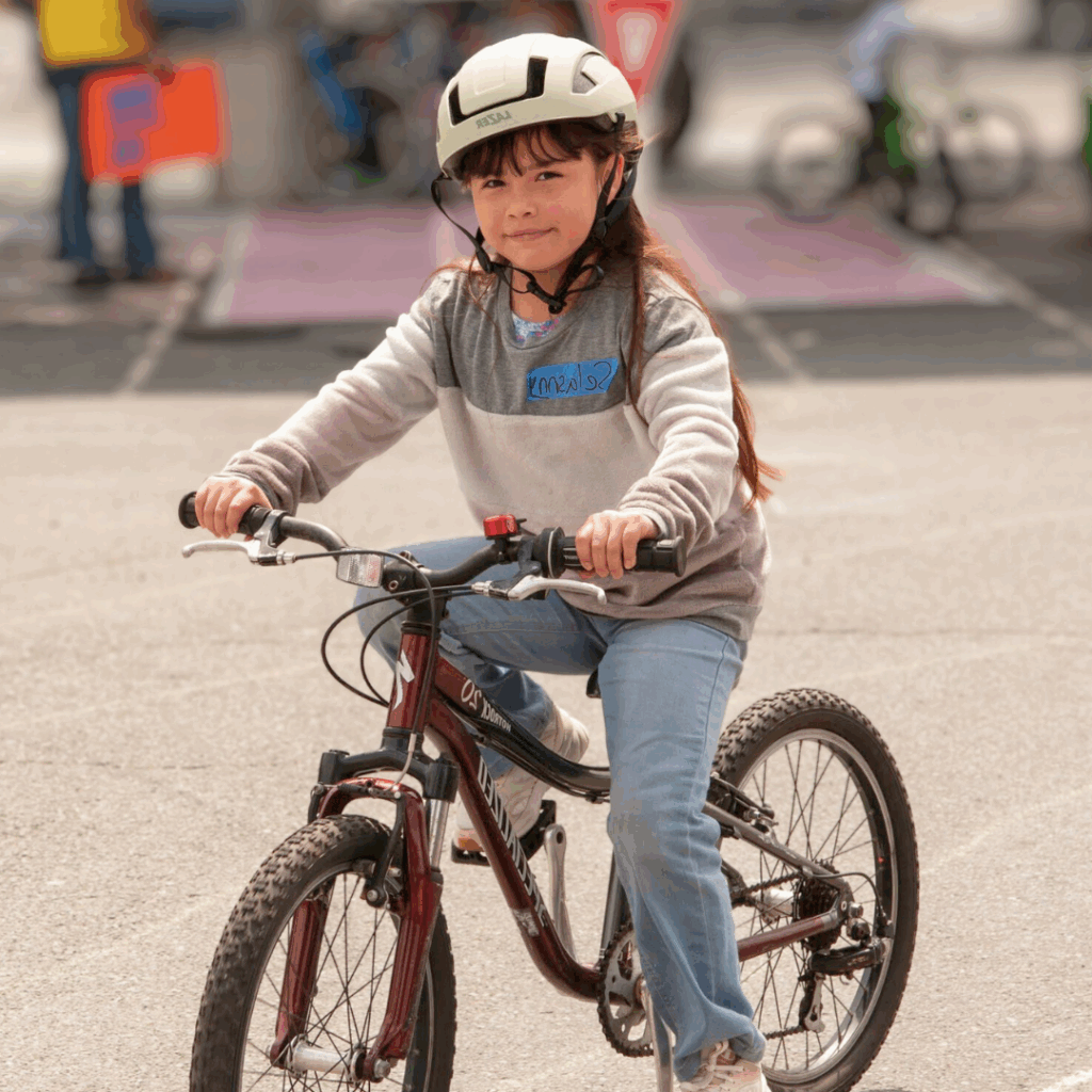 Little girl riding a bike