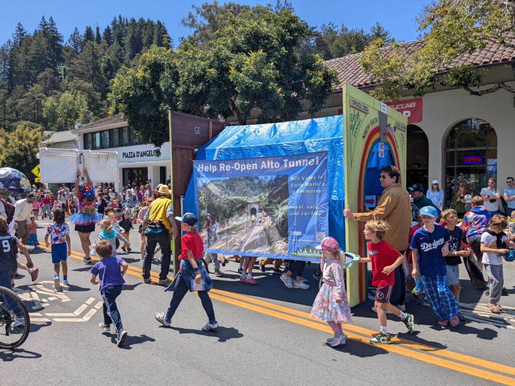 Alto Tunnel parade float marching in the Mill Valley Memorial Day Parade