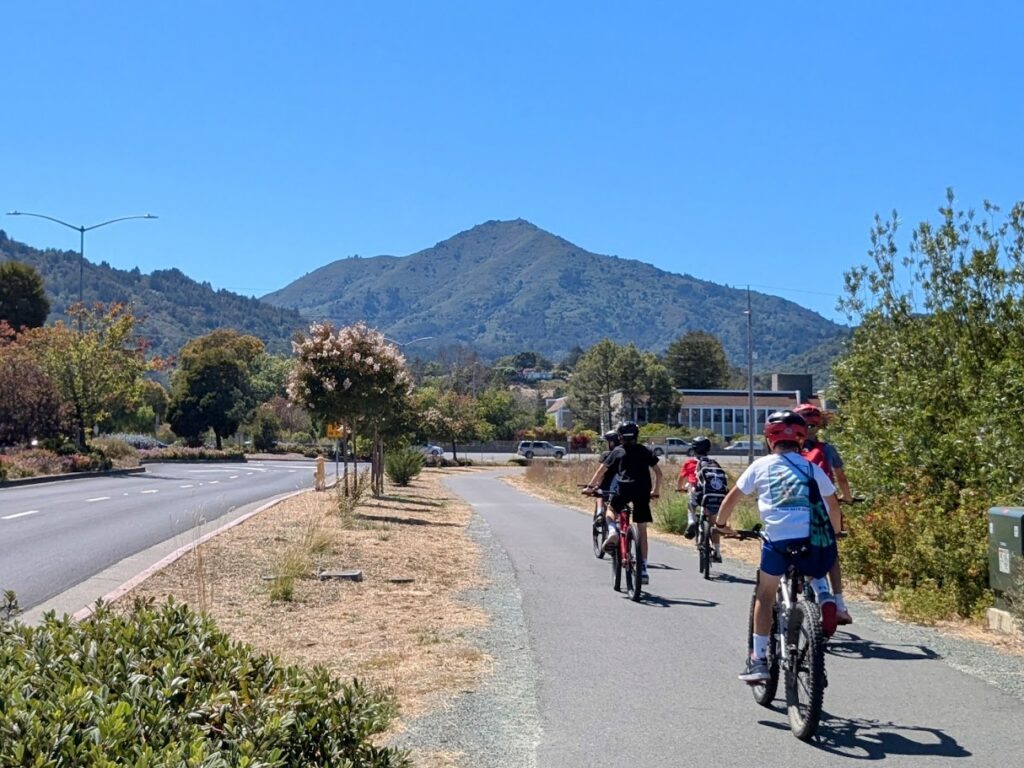 Kids on bikes with Mt Tam in the background